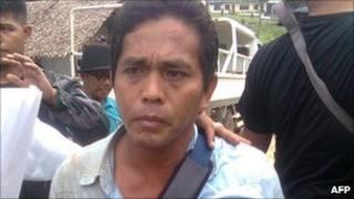 Philippine school official Hipolito Lastimado, one of the hostages freed by the gunmen