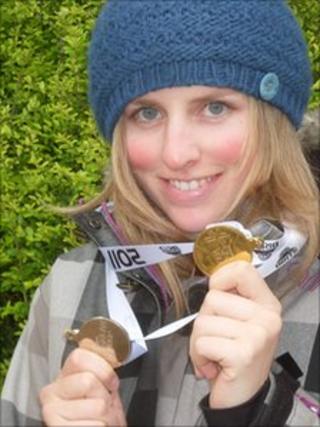 Kate Foster displays her two medals
