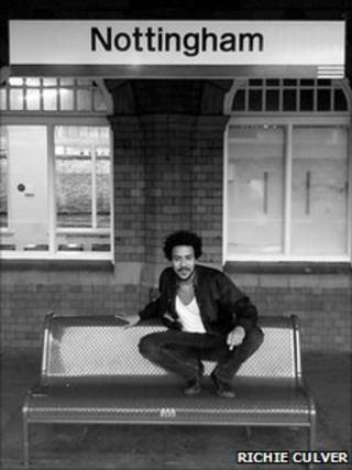Liam Bailey on a bench at Nottingham Station