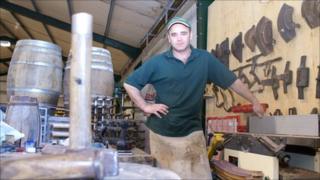 Brewery cooper Pete Coates at his workshop in St Asaph, Denbighshire.
