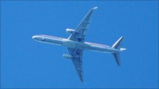The American Airlines plane in the air