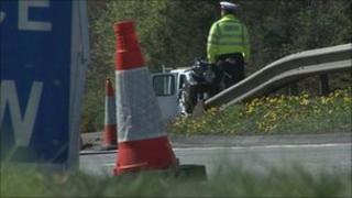 Police at the scene of the crash on the A338 near Bournemouth
