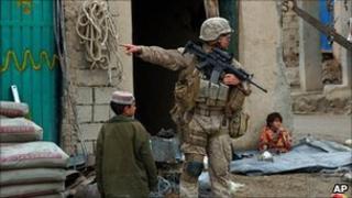 File picture of US soldier on patrol in the main bazaar in Sangin
