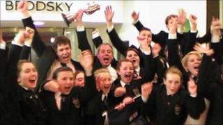 Band members celebrating their success