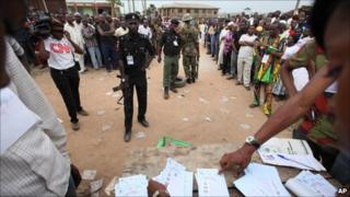 People watching the votes being counted at the parliamentary elections