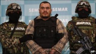 Mexican marines escort Martin Omar Estrada, alleged mastermind of the killings in San Fernando