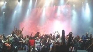 Fans invade the stage during M.I.A's headline act at the Big Chill
