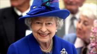 Queen Elizabeth II smiles as she visits the Newmarket Day Centre on 3 May 2011