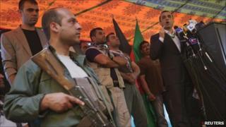 Former intelligence chief Amrullah Saleh (right) speaks during a gathering in Kabul