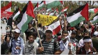 Palestinians protest at the Syrian border near the Israeli-controlled Golan Heights