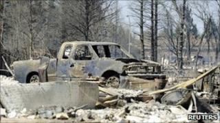 A burned out vehicle in Slave Lake in Alberta