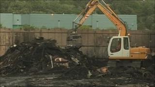 Clean-up after the fire at Alex Smiles Ltd