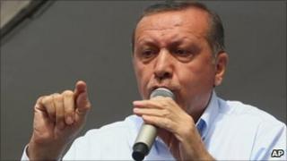 Turkish Prime Minister Recep Tayyip Erdogan addresses supporters at an election rally on 17 May 2011.
