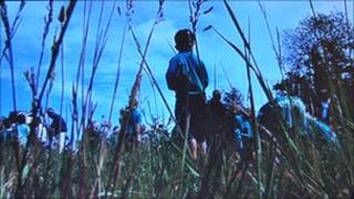Villagers look around the former Bures Common