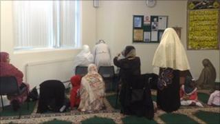 Muslim women at prayer in Madina mosque Manchester
