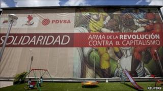 Children play at the headquarters of the state oil company PDVSA in Caracas 24 May 2011