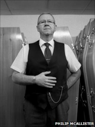 Man with coffins
