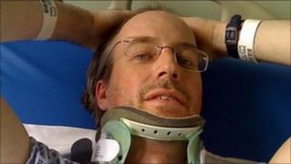 Professor Donal McNally in hospital after being hit by a car whilst cycling