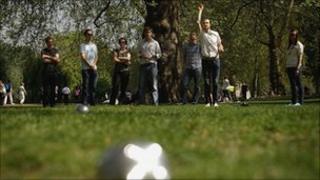 People playing bowls