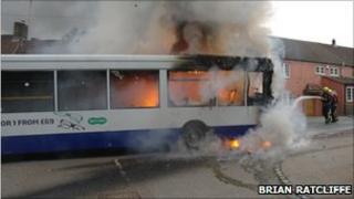 Firefighters tackling bus fire - Brian Ratcliffe