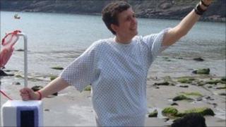Deborah Barber-Jones strapped to a knitted chemotherapy pump