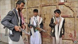 Armed tribesman loyal to Sheik Sadeq al-Ahmar