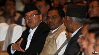 Nepalese Prime Minister Jhalnath Khanal (L), ministers and lawmakers attend a parliament session in Kathmandu on 28 May 2011