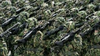 Sri Lankan snipers participate in a victory day parade marking the second anniversary of the end of the civil war, in Colombo, Sri Lanka, Friday, May 27, 2011