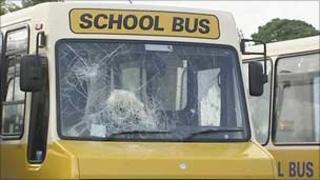 School bus with smashed window