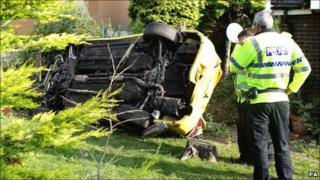 Overturned car after police crash