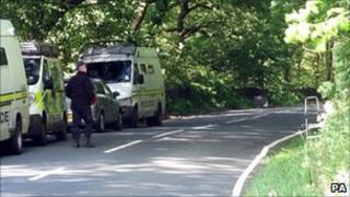 Police vans near Woodsome Hall Golf Club, Huddersfield