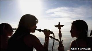 Young women smoking hookahs (generic image)