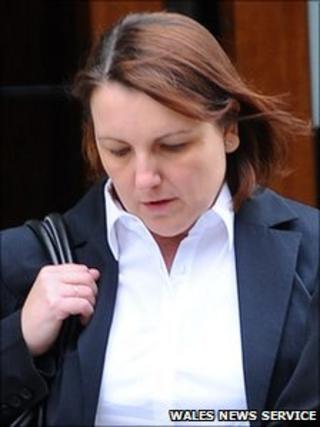 Joanne Evans leaves the hearing in Cardiff on Wednesday