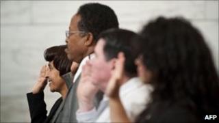 File photo of immigrants taking the US citizenship oath