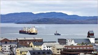 Hong Kong flagged Nordic Barents leaves Kirkenes in the north of Norway on route to China