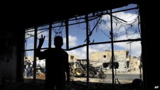 Libyan rebel fighter in ruined building, Misrata (12 June 2011)