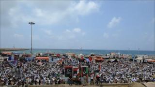 Libyans attend Friday prayers at Revolution Square in Benghazi, 27 May