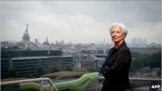 Christine Lagarde poses on the roof of her office