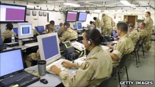 Soldiers at computer screens