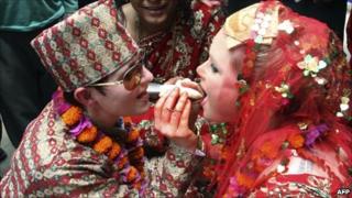Courtney Mitchell (left) and Sarah Welton getting married