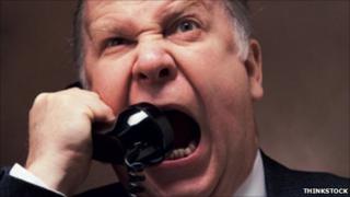 Boss on telephone