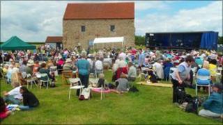 Pilgrims at the Chapel of St Peter's on the Wall in Bradwell-on-Sea