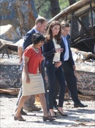 Prince William, Duke of Cambridge and Catherine, Duchess of Cambridge visiting a part of town devastated by a fire