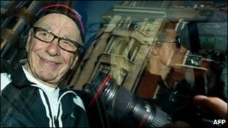 Rupert Murdoch leaves his London home
