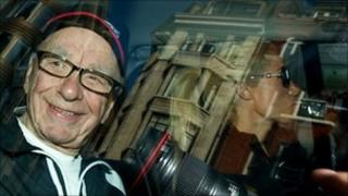 Rupert Murdoch leaves his London flat on Monday