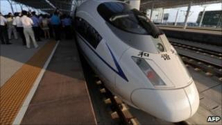 A high-speed train arrives at the Bengbu station, east China's Anhui province, one of the stops of the Beijing to Shanghai line which was launched on 30 June 2011