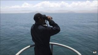 A Navy sailor looking for the seven men lost at sea