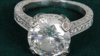 South Yorkshire Crimewatch appeal. White gold with diamond encrusted shoulders and a centre solitaire 5-6 ct diamond.