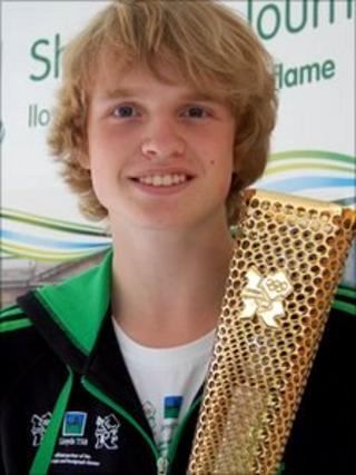 Eddie Graver with the Olympic torch prototype