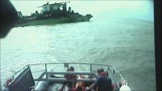 Royal Navy divers on board lifeboat